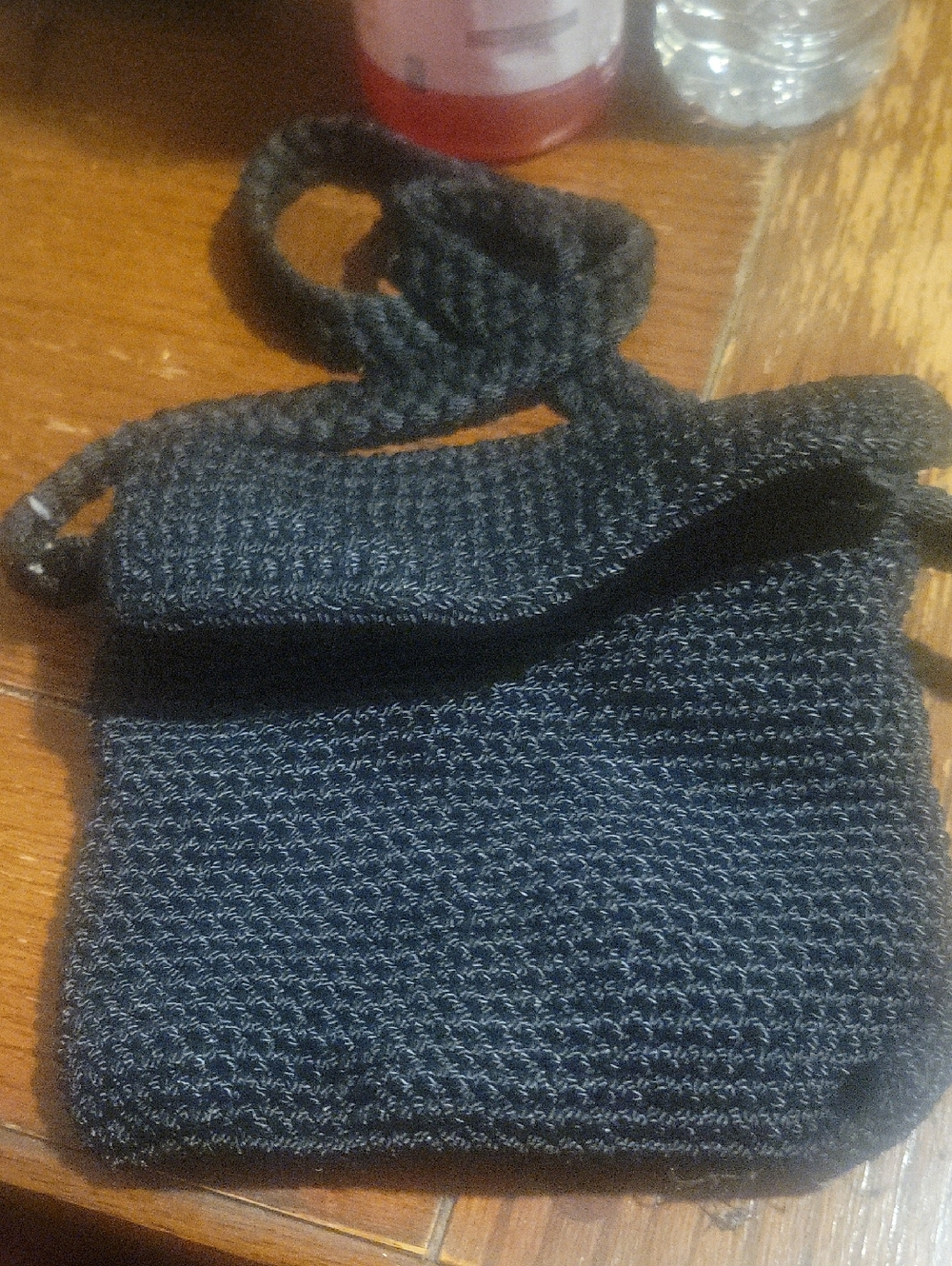 The Sak Black Knit Crossbody Bag with Logo Plate